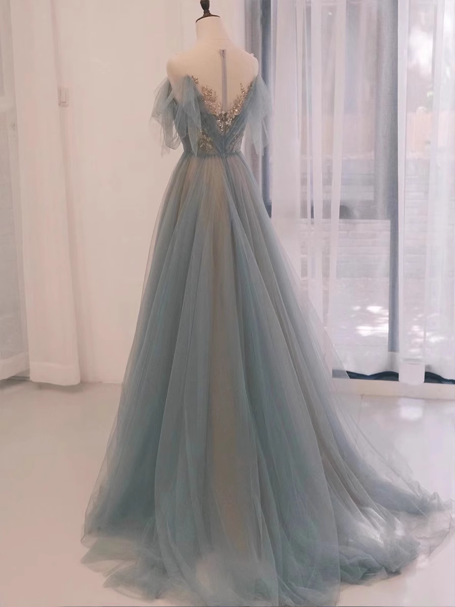 Une ligne sans bretelles longueur au sol en tulle bleu longues robes de bal B010