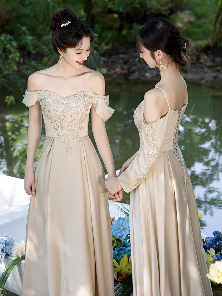 Robe de demoiselle d'honneur longue en satin à épaules dénudées et coupe trapèze élégante C3933