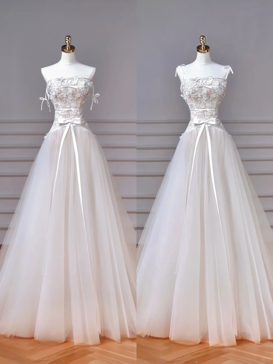 Jolie robe de mariée longue en tulle et dentelle avec bretelles spaghetti et appliques C4385