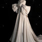 Robe de mariée chic en satin à manches mi-longues et épaules dénudées avec volants C3259