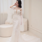Robe de mariée sirène intemporelle sans bretelles en tulle avec appliques et manches longues C3831