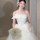 Robe de mariée longue élégante en tulle, sans bretelles, avec appliques, C4053