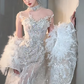 Superbe robe de mariée sirène bustier en tulle à sequins et cape longue C4058