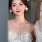 Robe de mariée sirène longue en tulle et dentelle avec décolleté en cœur et manches longues C4070