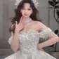 Superbe robe de mariée longue en tulle, épaules dénudées, sequins et perles, C4074