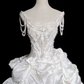 Robe de mariée longue vintage en satin à bretelles spaghetti et perles C4381