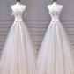 Jolie robe de mariée longue en tulle et dentelle avec bretelles spaghetti et appliques C4385