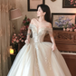 Superbe robe de mariée longue en tulle à sequins et décolleté en cœur C4041
