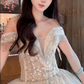 Superbe robe de mariée longue en tulle à sequins et décolleté en cœur C4041